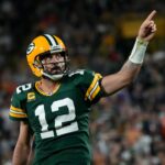 Green Bay Packers quarterback Aaron Rodgers (12) celebrates after rushing for a first down during the fourth quarter of their game against the Chicago Bears on Sunday, Sept. 18, 2022 at Lambeau Field in Green Bay. Mjs Packers Bears Packers19 3137 114468354