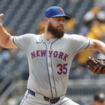 Jul 8, 2024; Pittsburgh, Pennsylvania, USA; New York Mets relief pitcher Adrian Houser (35) throws against the Pittsburgh Pirates during the eighth inning at PNC Park. The Pirates won 8-2. Mandatory Credit: Charles LeClaire-USA TODAY Sports