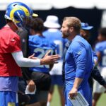 Jul 31, 2024; Los Angeles, CA, USA; Los Angeles Rams quarterback Matthew Stafford (9) and head coach Sean McVay talk during training camp at Loyola Marymount University. Mandatory Credit: Kiyoshi Mio-USA TODAY Sports