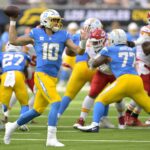 Sep 29, 2024; Inglewood, California, USA; Los Angeles Chargers quarterback Justin Herbert (10) throws a pass in the first half against the Kansas City Chiefs at SoFi Stadium.