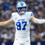 Oct 13, 2024; Arlington, Texas, USA; Detroit Lions defensive end Aidan Hutchinson (97) reacts during the second quarter against the Dallas Cowboys at AT&T Stadium. Mandatory Credit: Kevin Jairaj-Imagn Images