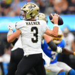 Oct 27, 2024; Inglewood, California, USA; New Orleans Saints quarterback Jake Haener (3) throws against the Los Angeles Chargers during the second half at SoFi Stadium. Mandatory Credit: Gary A. Vasquez-Imagn Images