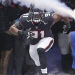 Oct 27, 2024; Houston, Texas, USA; Houston Texans defensive tackle Folorunso Fatukasi (91) runs onto the field before the game against the Indianapolis Colts at NRG Stadium.