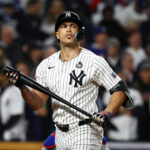 Oct 29, 2024; Bronx, New York, USA; New York Yankees designated hitter Giancarlo Stanton (27) reacts after striking out against the Los Angeles Dodgers in the fifth inning during game four of the 2024 MLB World Series at Yankee Stadium. Mandatory Credit: Vincent Carchietta-Imagn Images