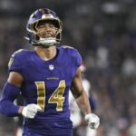 Nov 7, 2024; Baltimore, Maryland, USA; Baltimore Ravens safety Kyle Hamilton (14) reacts after tips a Cincinnati Bengals quarterback Joe Burrow (9) pass during the first quarter at M&T Bank Stadium. Mandatory Credit: Tommy Gilligan-Imagn Images