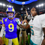 Nov 11, 2024; Inglewood, California, USA; Los Angeles Rams quarterback Matthew Stafford (9) meets with Miami Dolphins cornerback Jalen Ramsey (5) following the game at SoFi Stadium.