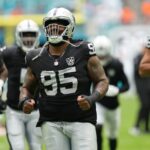 Nov 17, 2024; Miami Gardens, Florida, USA; Las Vegas Raiders defensive tackle John Jenkins (95) warms-up before the game against the Miami Dolphins at Hard Rock Stadium. Mandatory Credit: Jim Rassol-Imagn Images