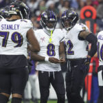 Dec 25, 2024; Houston, Texas, USA; Baltimore Ravens quarterback Lamar Jackson (8) and running back Derrick Henry (22) before a play during the game against the Houston Texans at NRG Stadium. Mandatory Credit: Troy Taormina-Imagn Images