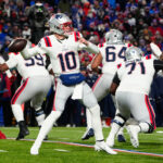 Dec 22, 2024; Orchard Park, New York, USA; New England Patriots quarterack Drake Maye (10) throws the ball against the Buffalo Bills during the first half at Highmark Stadium. Mandatory Credit: Gregory Fisher-Imagn Images