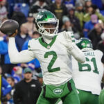 Dec 29, 2024; Orchard Park, New York, USA; New York Jets quarterback Tyrod Taylor (2) throws the ball against the Buffalo Bills during the second half at Highmark Stadium. Mandatory Credit: Gregory Fisher-Imagn Images
