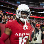 Jan 5, 2025; Glendale, Arizona, USA; Arizona Cardinals wide receiver Marvin Harrison Jr. (18) against the San Francisco 49ers at State Farm Stadium. Mandatory Credit: Mark J. Rebilas-Imagn Images