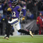 Jan 11, 2025; Baltimore, Maryland, USA; Baltimore Ravens running back Derrick Henry (22) runs to score a touchdown against the Pittsburgh Steelers in the third quarter in an AFC wild card game at M&T Bank Stadium. Mandatory Credit: Tommy Gilligan-Imagn Images