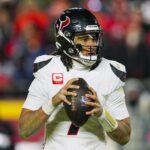 Jan 18, 2025; Kansas City, Missouri, USA; Houston Texans quarterback C.J. Stroud (7) drops back to pass during the second half against the Kansas City Chiefs in a 2025 AFC divisional round game at GEHA Field at Arrowhead Stadium