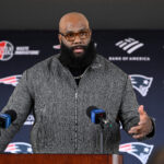 Mar 13, 2025; Foxborough, MA, USA; New England Patriots offensive tackle Morgan Moses discusses his recent free agent addition to the Patriots with the media at Gillette Stadium. Mandatory Credit: Eric Canha-Imagn Images