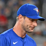 Mar 29, 2025; Toronto, Ontario, CAN; Toronto Blue Jays pitcher Max Scherzer (31) walks to the dugout after giving up two home run against the Baltimore Orioles in the first inning at Rogers Centre. Mandatory Credit: Dan Hamilton-Imagn Images