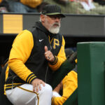 Apr 7, 2025; Pittsburgh, Pennsylvania, USA; Pittsburgh Pirates manager Derek Shelton (17) looks on from the dugout against the St. Louis Cardinals during the first inning at PNC Park. Mandatory Credit: Charles LeClaire-Imagn Images