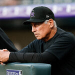 Apr 9, 2025; Denver, Colorado, USA; Colorado Rockies manager Bud Black (10) looks on in the first inning against the Milwaukee Brewers at Coors Field. Mandatory Credit: Isaiah J. Downing-Imagn Images