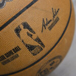 Apr 11, 2025; Dallas, Texas, USA; A view of an NBA basketball and the NBA logo before the game between the Dallas Mavericks and the Toronto Raptors at the American Airlines Center.