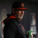 Apr 24, 2025; Washington, District of Columbia, USA; Baltimore Orioles manager Brandon Hyde stands in the dugout prior to the start of the game against the Washington Nationals at Nationals Park.