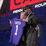 Penn State defensive end Abdul Carter poses with NFL Commissioner Roger Goodell after being selected 3rd overall by the New York Giants during the first round of the 2025 NFL Draft at Lambeau Field on April 24, 2025 in Green Bay, Wisconsin.