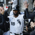 Apr 29, 2025; Chicago, Illinois, USA; Chicago White Sox center fielder Luis Robert Jr. (88) celebrates with teammates after hitting a solo home run against the Milwaukee Brewers during the first inning at Rate Field. Mandatory Credit: Kamil Krzaczynski-Imagn Images