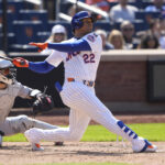 May 1, 2025; New York City, New York, USA; New York Mets right fielder Juan Soto (22) hits his second home run of the game against the Arizona Diamondbacks during the eighth inning at Citi Field. Mandatory Credit: Gregory Fisher-Imagn Images