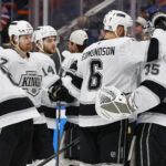May 1, 2025; Edmonton, Alberta, CAN;The Los Angeles Kings console Los Angeles Kings goaltender Darcy Kuemper (35) after the Edmonton Oilers eliminated them in game six of the first round of the 2025 Stanley Cup Playoffs at Rogers Place. Mandatory Credit: Perry Nelson-Imagn Images