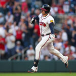 May 4, 2025; Atlanta, Georgia, USA; Atlanta Braves third baseman Austin Riley (27) celebrates after a two-run home run against the Los Angeles Dodgers in the third inning at Truist Park. Mandatory Credit: Brett Davis-Imagn Images