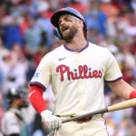 May 4, 2025; Philadelphia, Pennsylvania, USA; Philadelphia Phillies first base Bryce Harper (3) reacts after flying out to center during the tenth inning against the Arizona Diamondbacks at Citizens Bank Park. Mandatory Credit: Eric Hartline-Imagn Images