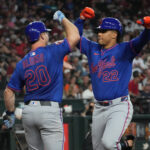 May 7, 2025; Phoenix, Arizona, USA; New York Mets outfielder Juan Soto (22) celebrates with first base Pete Alonso (20) after hitting a solo home run against the Arizona Diamondbacks in the sixth inning at Chase Field. Mandatory Credit: Rick Scuteri-Imagn Images