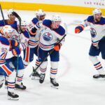 May 8, 2025; Las Vegas, Nevada, USA; Edmonton Oilers center Leon Draisaitl (29) celebrates with team mates after scoring a game-winning goal against the Vegas Golden Knights during an overtime period of game two of the second round of the 2025 Stanley Cup Playoffs at T-Mobile Arena. Mandatory Credit: Stephen R. Sylvanie-Imagn Images