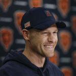 May 9, 2025; Lake Forest, IL, USA; Chicago Bears head coach Ben Johnson (R) speaks during the Rookie Minicamp at Halas Hall. Mandatory Credit: Kamil Krzaczynski-Imagn Images