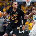 May 9, 2025; Indianapolis, Indiana, USA; Cleveland Cavaliers guard Darius Garland (10) dribbles the ball while Indiana Pacers forward Aaron Nesmith (23) defends during game three of the second round for the 2025 NBA Playoffs at Gainbridge Fieldhouse.
