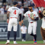 May 10, 2025; Minneapolis, Minnesota, USA; Minnesota Twins shortstop Carlos Correa (4) and Minnesota Twins outfielder Byron Buxton (25) celebrate a victory over the San Francisco Giants at Target Field. Mandatory Credit: Matt Blewett-Imagn Images