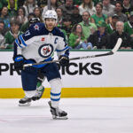 May 11, 2025; Dallas, Texas, USA; Winnipeg Jets center Adam Lowry (17) in action during the game between the Dallas Stars and the Winnipeg Jets in game three of the second round of the 2025 Stanley Cup Playoffs at American Airlines Center. Mandatory Credit: Jerome Miron-Imagn Images