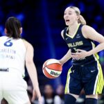 May 16, 2025; Arlington, Texas, USA; Dallas Wings guard Paige Bueckers (5) yells as Minnesota Lynx forward Bridget Carleton (6) defends during the second half at College Park Center.