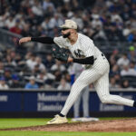 May 16, 2025; Bronx, New York, USA; New York Yankees pitcher Devin Williams (38) pitches against the New York Mets during the eighth inning at Yankee Stadium. Mandatory Credit: John Jones-Imagn Images