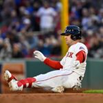 May 19, 2025; Boston, Massachusetts, USA; Boston Red Sox third baseman Alex Bregman (2) slides into second base during the third inning against the New York Mets at Fenway Park. Mandatory Credit: Eric Canha-Imagn Images