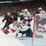 May 20, 2025; Raleigh, North Carolina, USA; Florida Panthers goaltender Sergei Bobrovsky (72) defends against Carolina Hurricanes forward Jordan Staal (11) during the second period in game one of the Eastern Conference Final of the 2025 Stanley Cup Playoffs at Lenovo Center. Mandatory Credit: James Guillory-Imagn Images