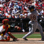 May 21, 2025; St. Louis, Missouri, USA; Detroit Tigers center fielder Javier Baez (28) hits a one run single against the St. Louis Cardinals during the eighth inning at Busch Stadium. Mandatory Credit: Jeff Curry-Imagn Images