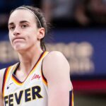 Indiana Fever guard Caitlin Clark (22) reacts to the action Saturday, May 24, 2025, during a game between the Indiana Fever and the New York Liberty at Gainbridge Fieldhouse in Indianapolis. The New York Liberty defeated the Indiana Fever, 90-88.