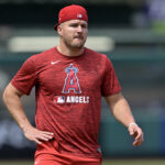 May 26, 2025; Anaheim, California, USA; Los Angeles Angels right fielder Mike Trout (27) works out on the field prior to the game against the New York Yankees at Angel Stadium. Mandatory Credit: Jayne Kamin-Oncea-Imagn Images