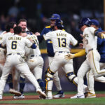 May 28, 2025; Milwaukee, Wisconsin, USA; The Milwaukee Brewers celebrate after defeating the Boston Red Sox at American Family Field. Mandatory Credit: Patrick Gorski-Imagn Images