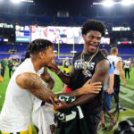 Aug 15, 2019; Baltimore, MD, USA; Baltimore Ravens quarterback Lamar Jackson (right) talks to Green Bay Packers cornerback Jaire Alexander (left) after the game at M&T Bank Stadium.
