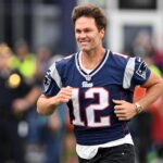 Sep 10, 2023; Foxborough, Massachusetts, USA; New England Patriots former quarterback Tom Brady runs on the field during a halftime ceremony in his honor during the game between the Philadelphia Eagles and New England Patriots at Gillette Stadium.