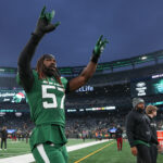 Dec 24, 2023; East Rutherford, New Jersey, USA; New York Jets linebacker C.J. Mosley (57) gestures to fans after the game against the Washington Commanders at MetLife Stadium. Mandatory Credit: Vincent Carchietta-USA TODAY Sports
