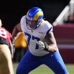 Jan 7, 2024; Santa Clara, California, USA; Los Angeles Rams offensive tackle Alaric Jackson (77) blocks San Francisco 49ers defensive tackle Javon Hargrave (98) during the first quarter at Levi's Stadium. Mandatory Credit: Darren Yamashita-USA TODAY Sports