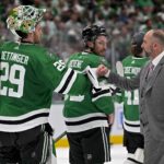 May 5, 2024; Dallas, Texas, USA; Dallas Stars head coach Peter DeBoer gives a fist bump to goaltender Jake Oettinger (29) after the Stars defeat the Vegas Golden Knights in game seven of the first round of the 2024 Stanley Cup Playoffs at American Airlines Center. Mandatory Credit: Jerome Miron-USA TODAY Sports