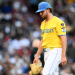 Sep 28, 2024; Boston, Massachusetts, USA; Boston Red Sox starting pitcher Kutter Crawford (50) walks of the field after being taken out of the game in the fifth inning against the Tampa Bay Rays at Fenway Park. Mandatory Credit: Brian Fluharty-Imagn Images