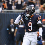 Sep 29, 2024; Chicago, Illinois, USA; Chicago Bears safety Jaquan Brisker (9) after sacking Los Angeles Rams linebacker Jared Verse (8) during the second half at Soldier Field. Mandatory Credit: Matt Marton-Imagn Images